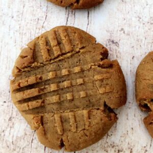 2 keto peanut butter cookies on a flat surface