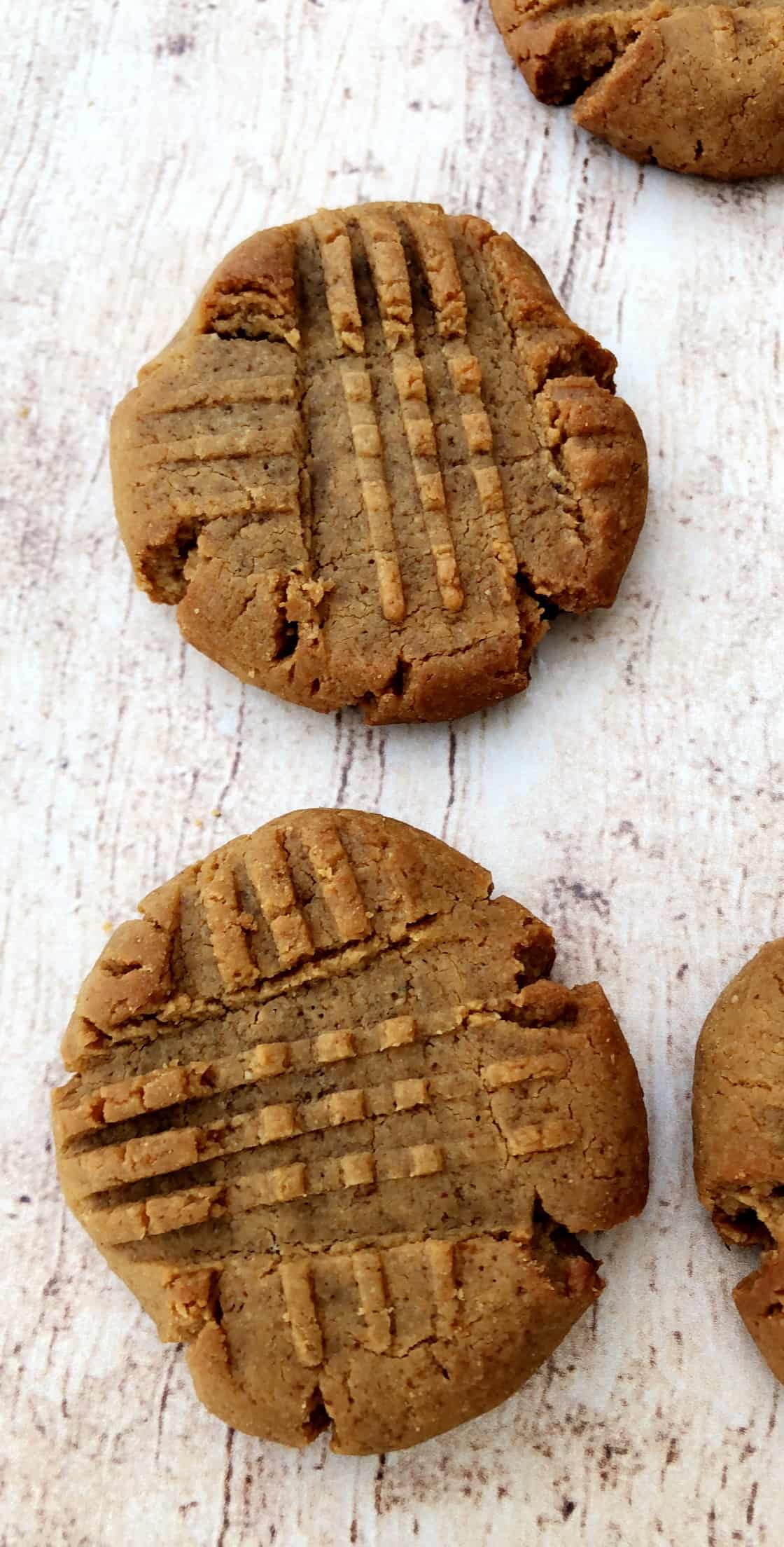 2 keto peanut butter cookies on a flat surface