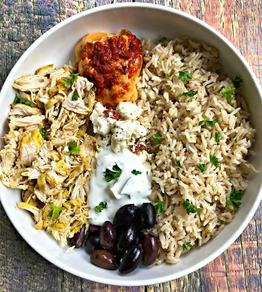 mediterranean chicken bowl in a white bowl