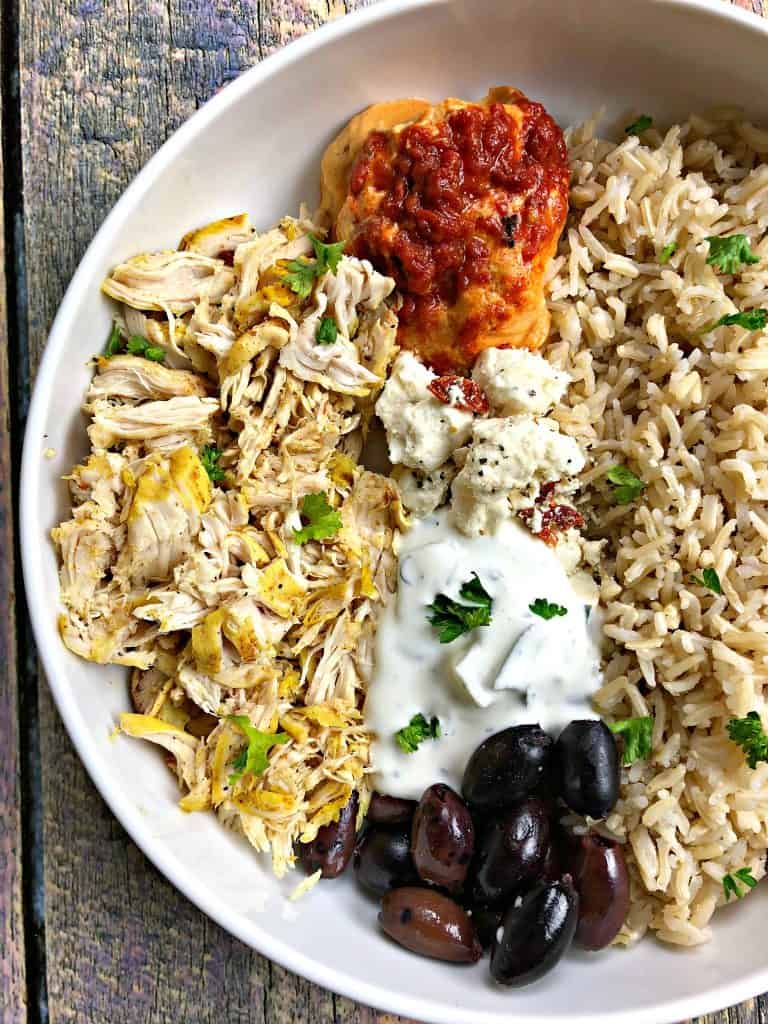 mediterranean chicken bowl in a white bowl