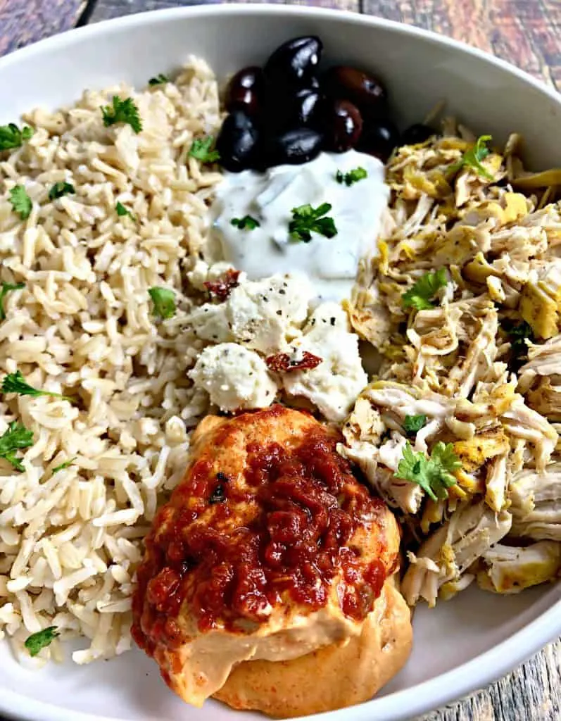 mediterranean chicken bowl in a white bowl