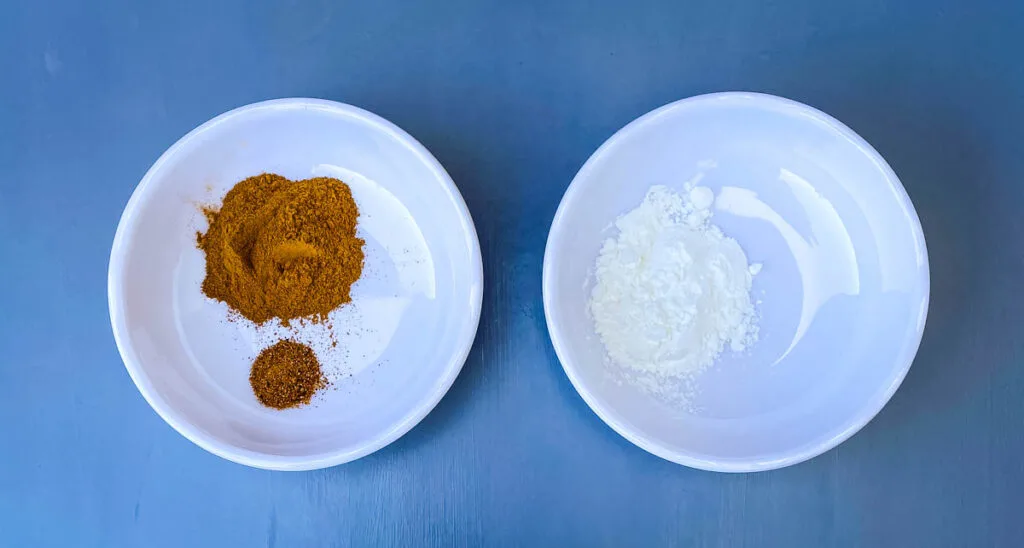 ground cinnamon, nutmeg, and cornstarch i separate small white bowls