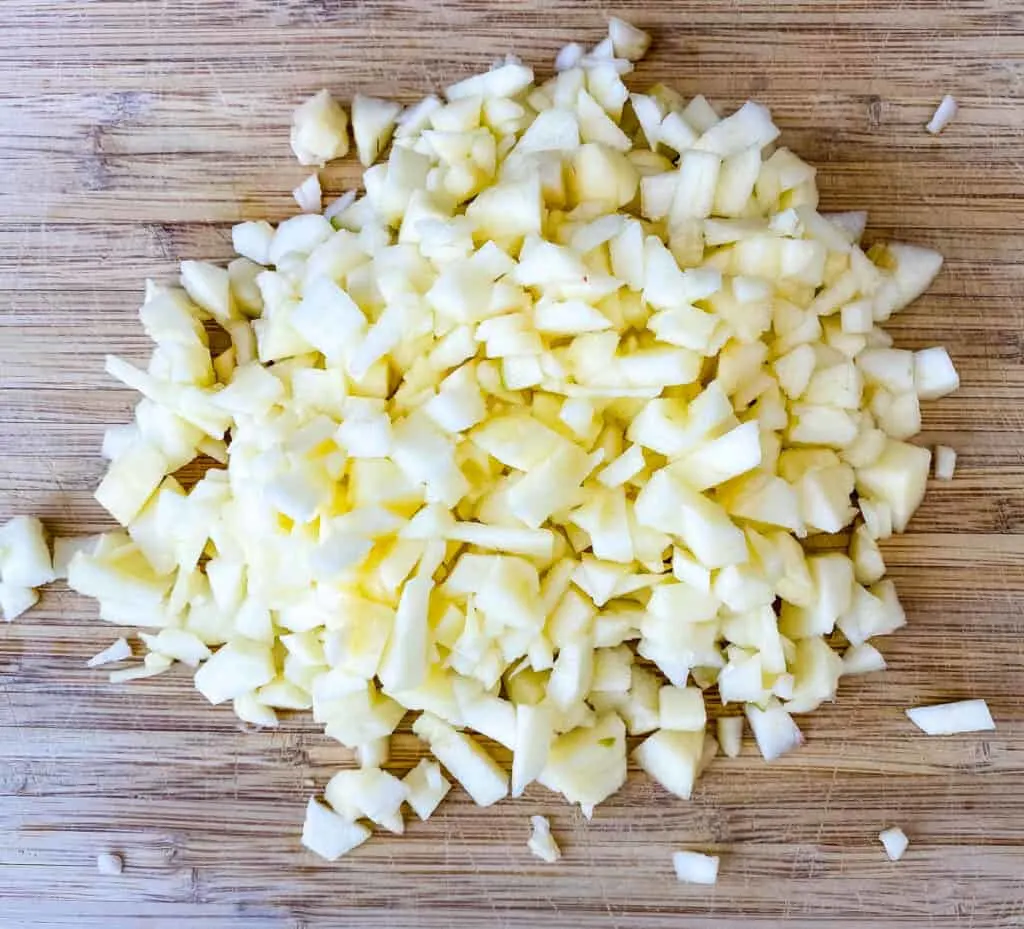 chopped apples on a cutting board