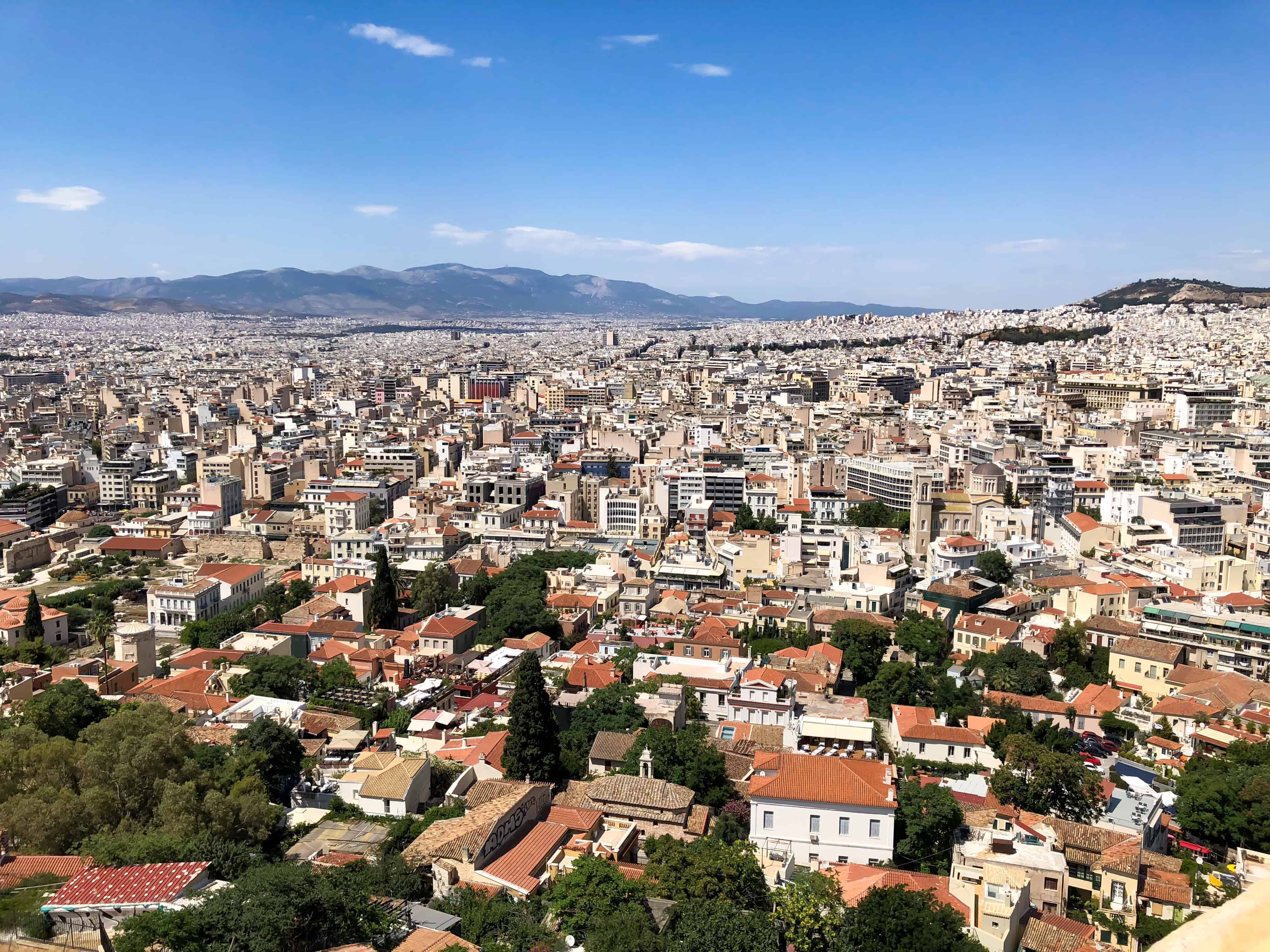 view of athens from acropolis from a rooftop