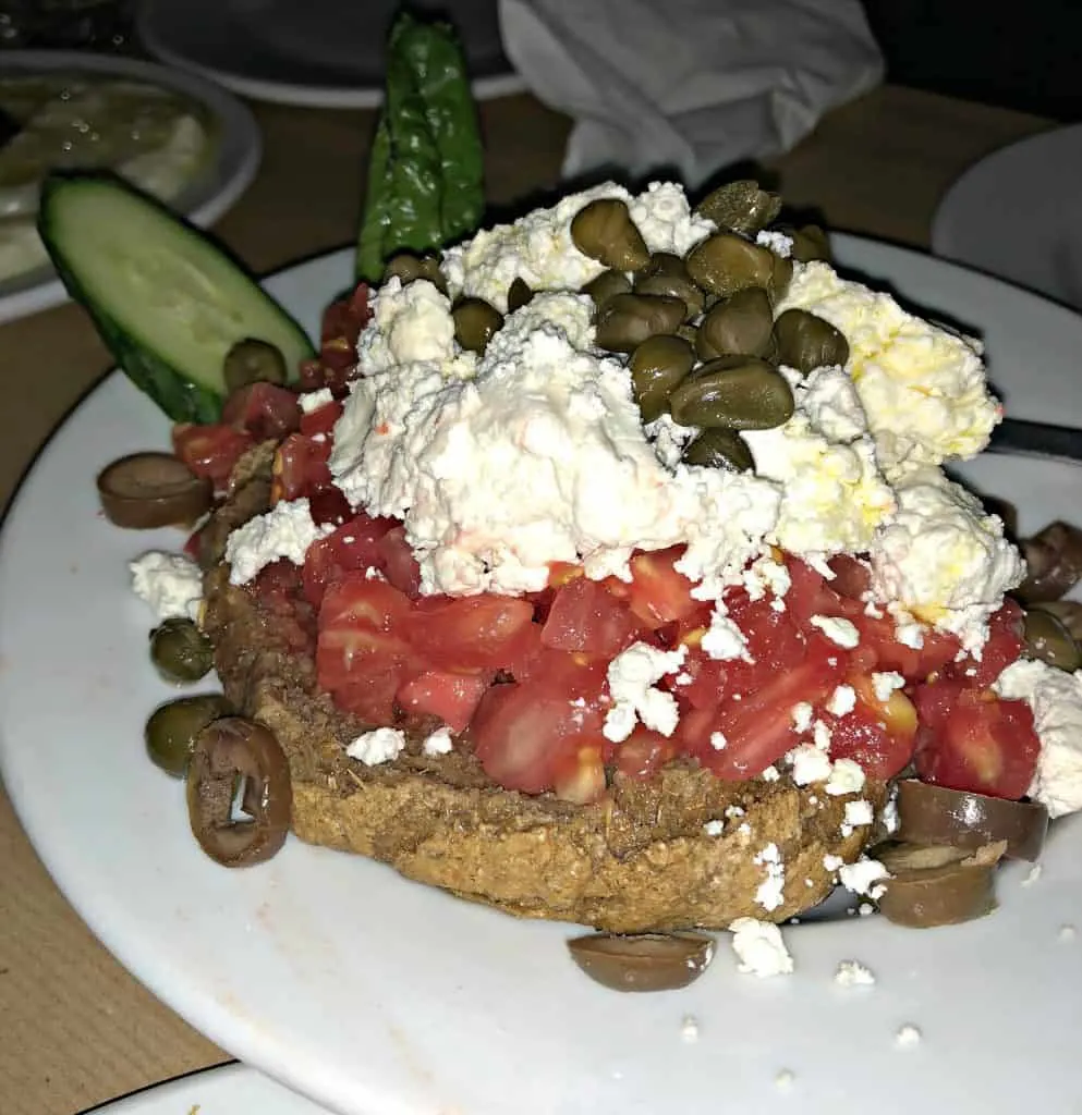 greek food with feta on a white plate