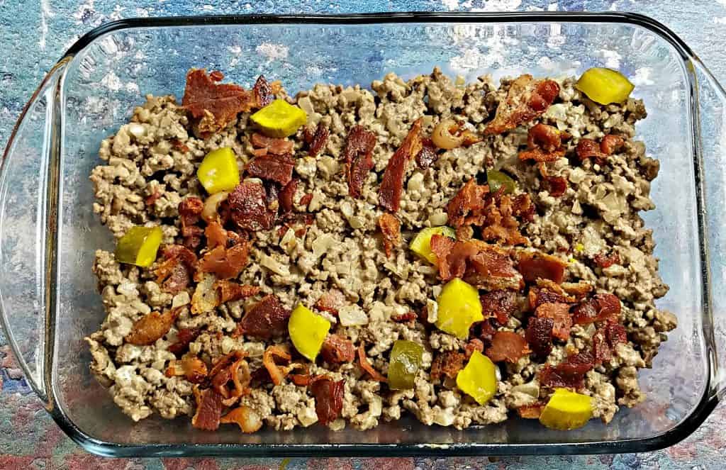 ground beef, pickles, and bacon in a baking dish