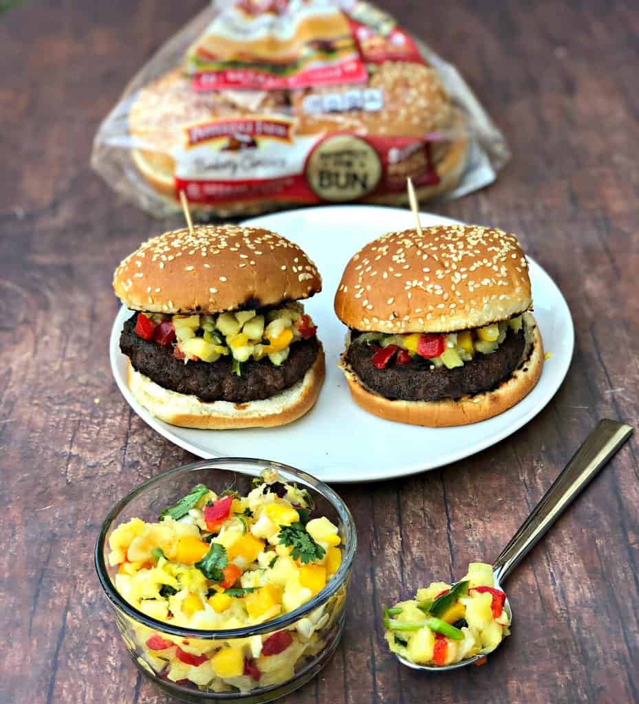 grilled burgers with tropical salsa on a plate