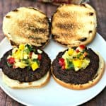 grilled burgers with tropical salsa on a plate