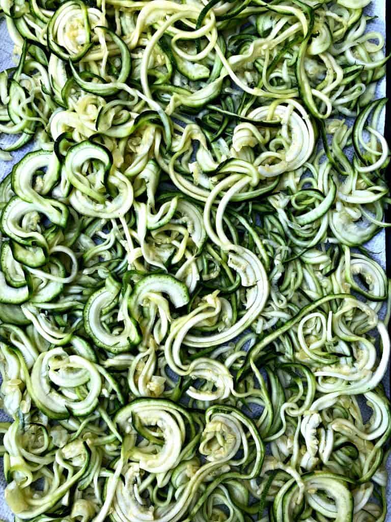 spriralized zucchini on a sheet pan