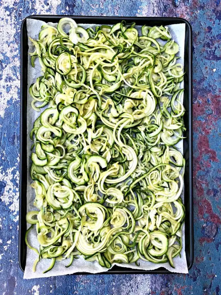 spiralized zucchini on a sheet pan
