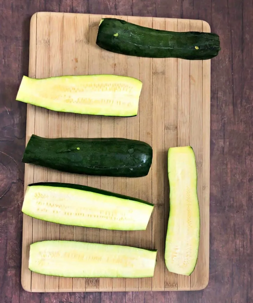raw zucchini on a cutting board
