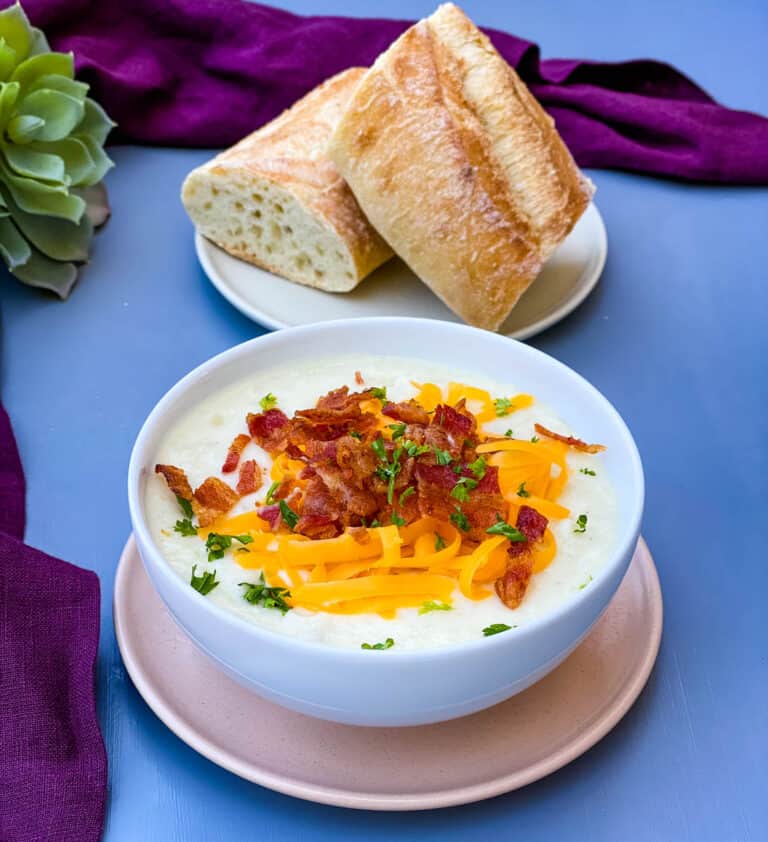 instant pot potato soup with bacon and cheese in 3 bowls