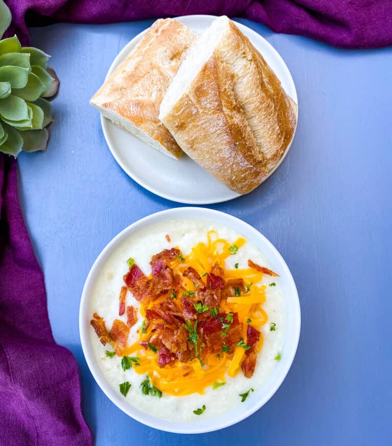 instant pot potato soup with bacon and cheese in 3 bowls