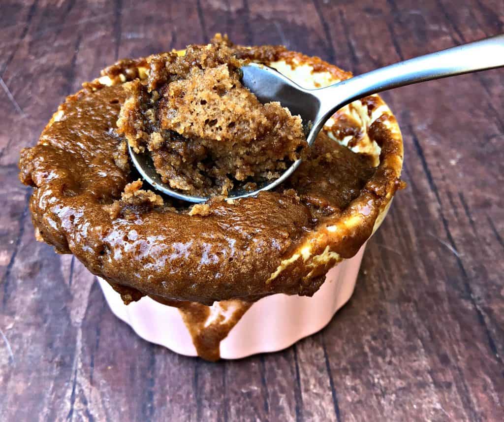 keto peanut butter chocolate chip mug cake in pink bowl