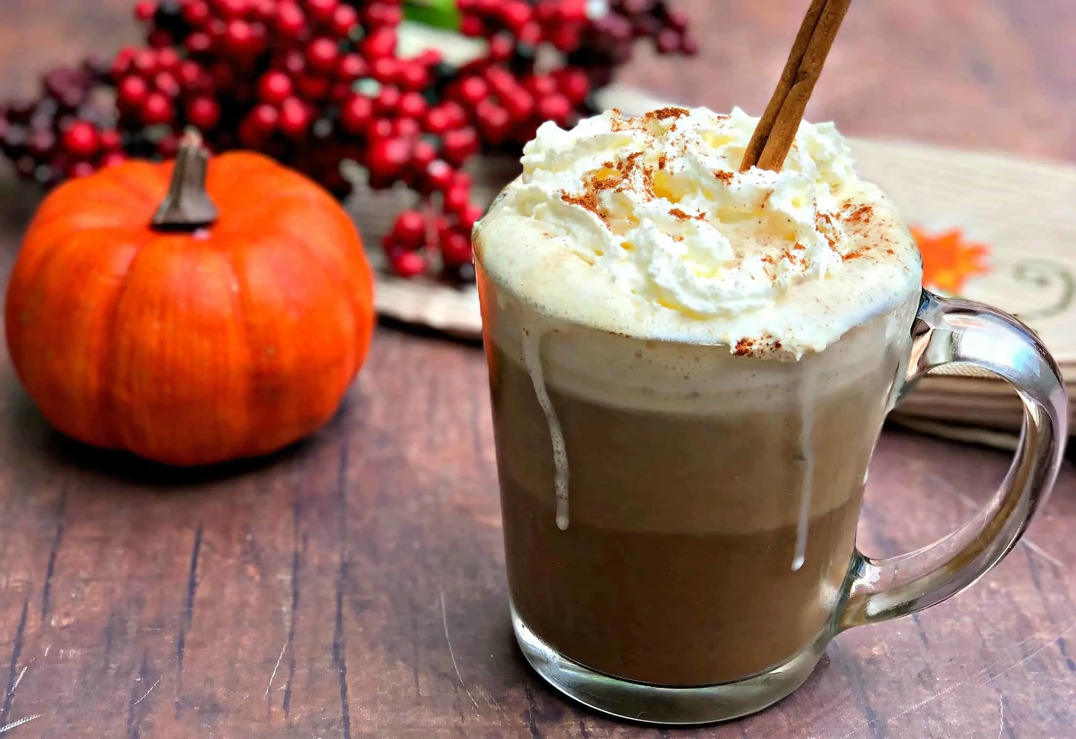 keto pumpkin spiced latte in a glass mug with whipped cream