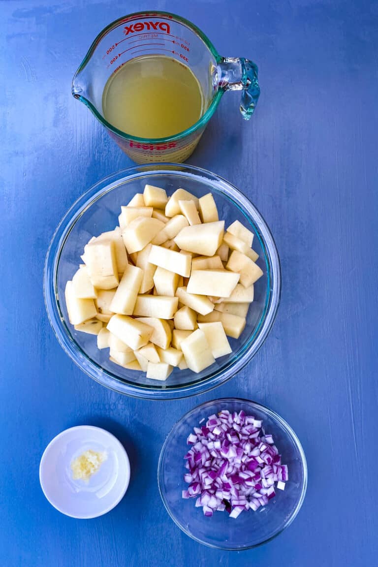 sliced potato chunks in two bowls 