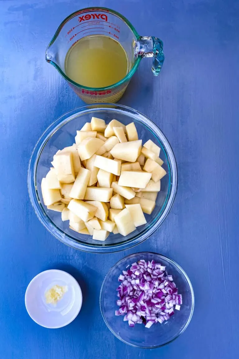 sliced potato chunks in two bowls 