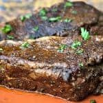 air fryer marinated steak on an orange plate