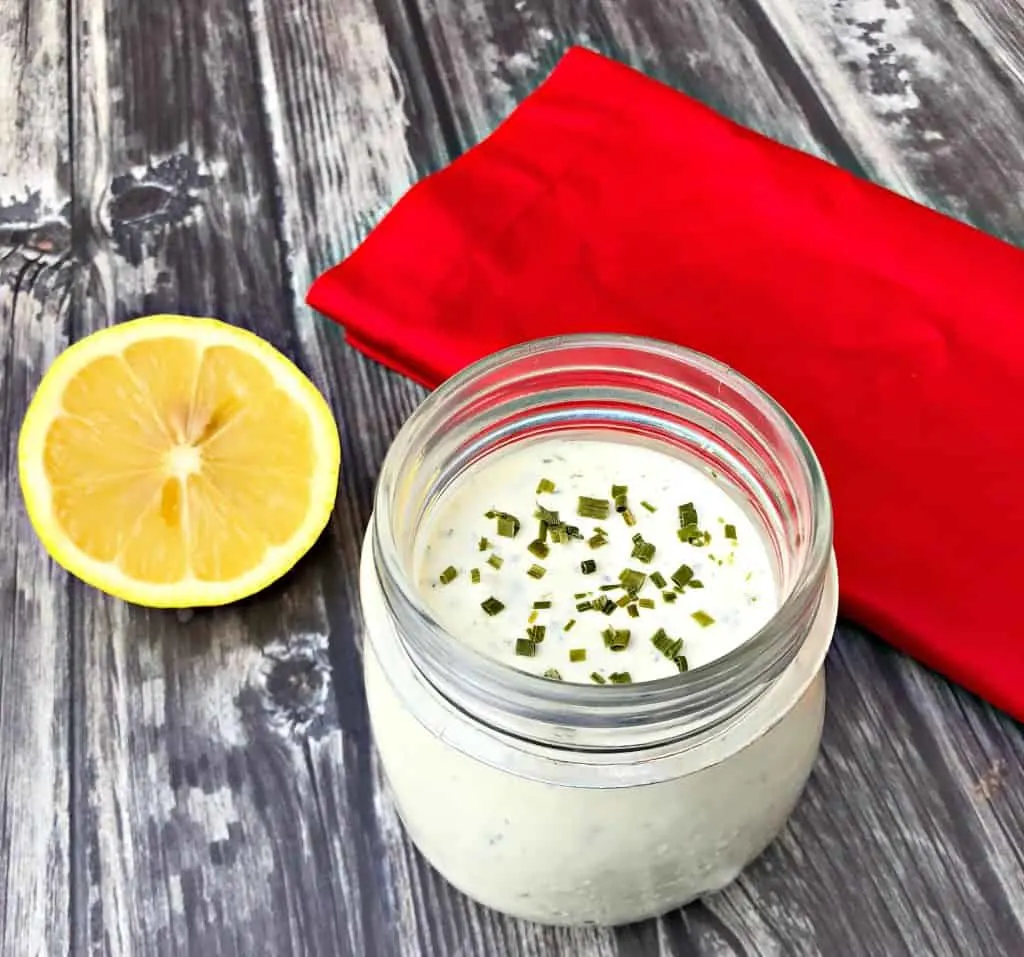 keto low carb ranch dressing with a spoon with lemon