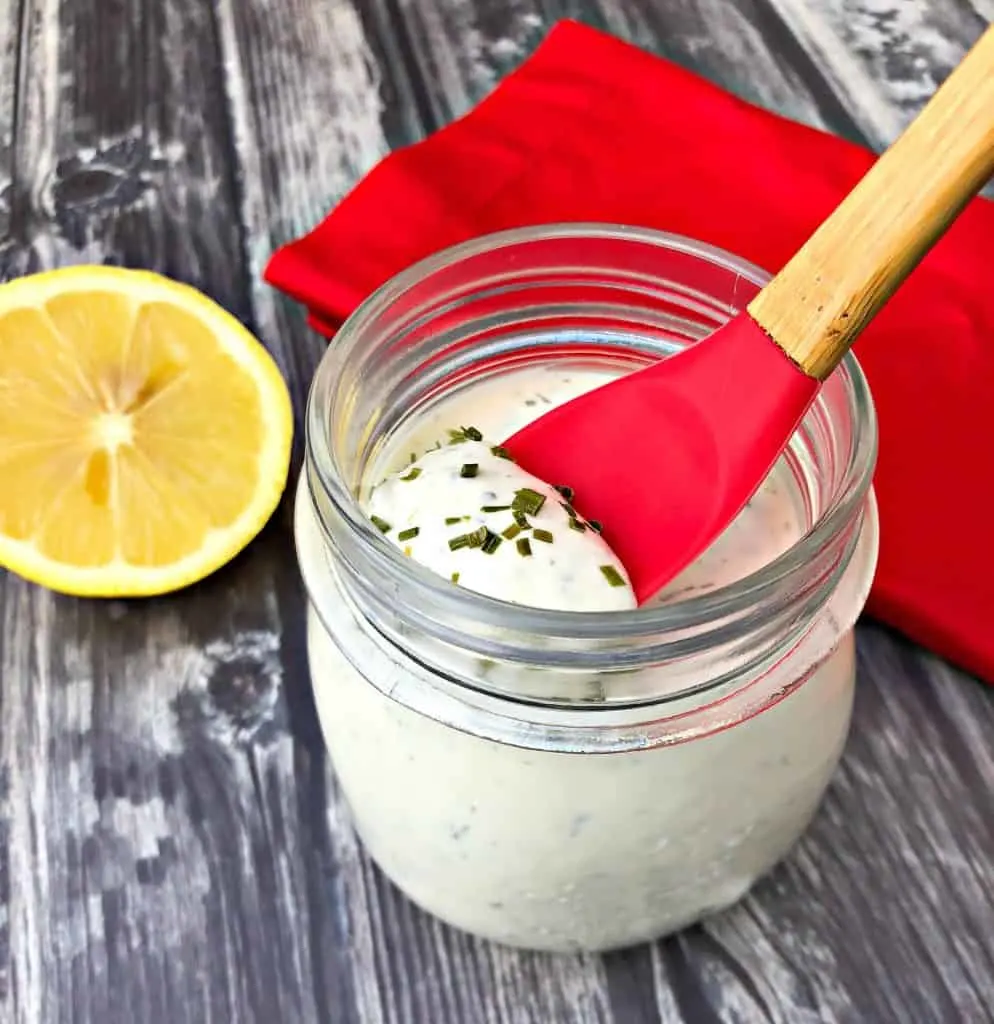 keto low carb ranch dressing with a spoon with lemon