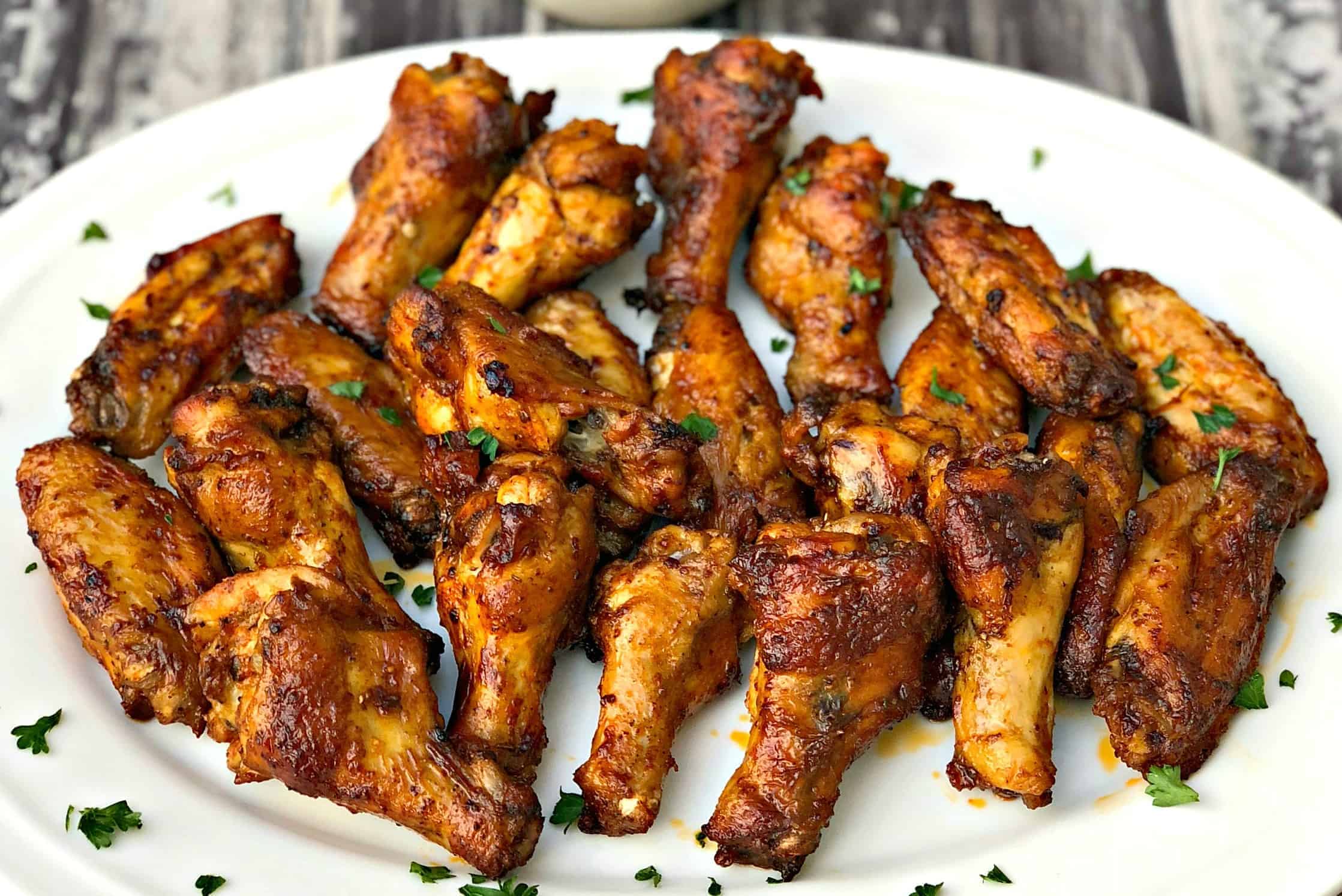 air fryer buffalo chicken wings on a white plate