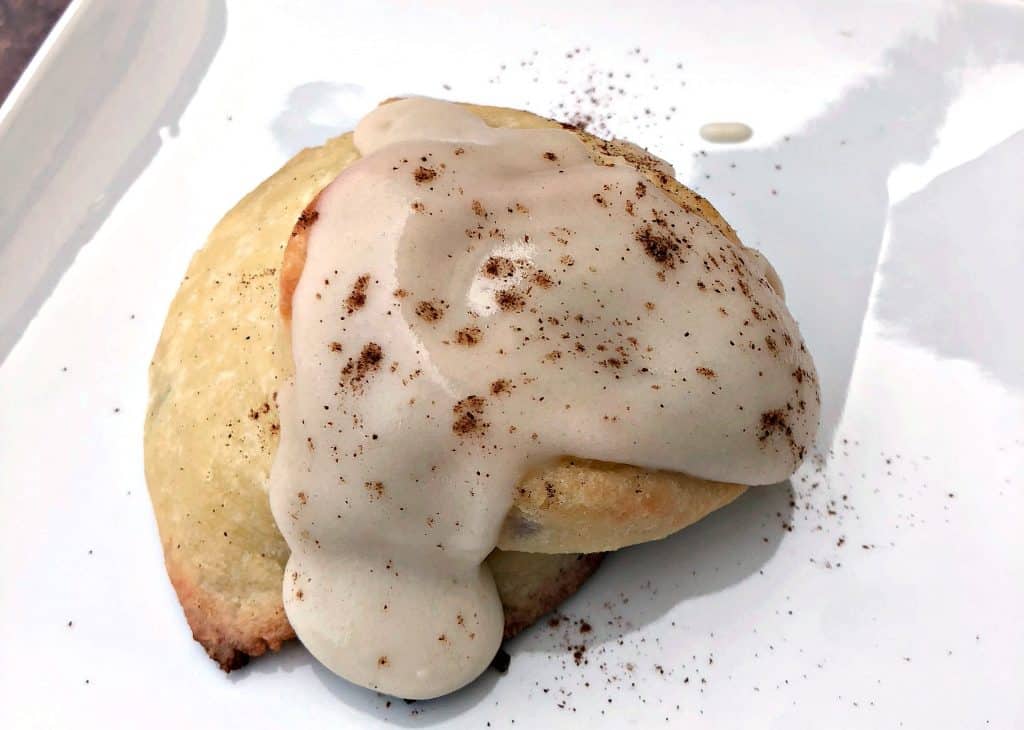 keto fathead cinnamon rolls on a white plate