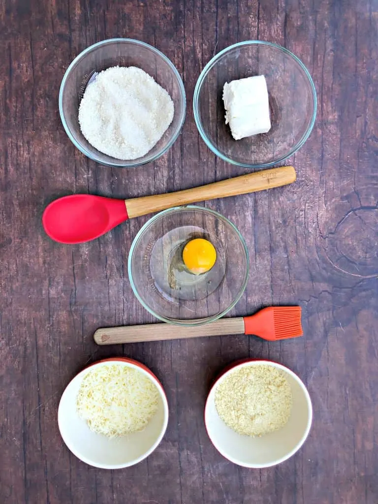 keto fathead cinnamon rolls ingredients on a brown table