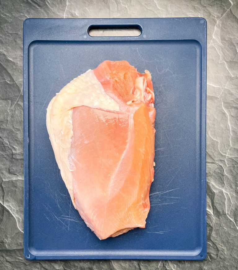 raw, seasoned turkey breast