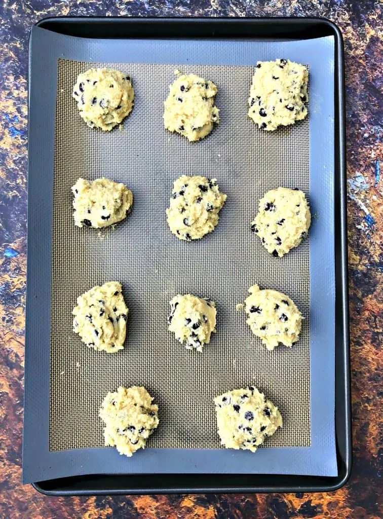 keto chocolate chip cookies on a cookie sheet