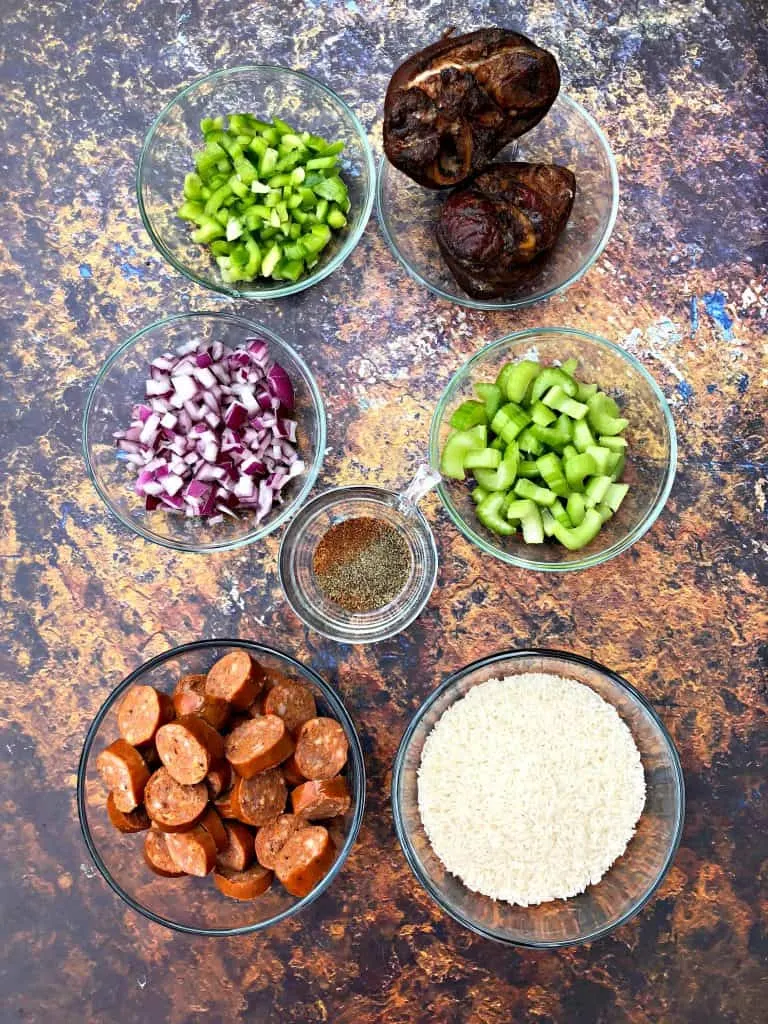 ingredients for red beans and rice in glass bowls