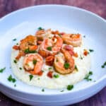 instant pot southern shrimp and grits in a white bowl