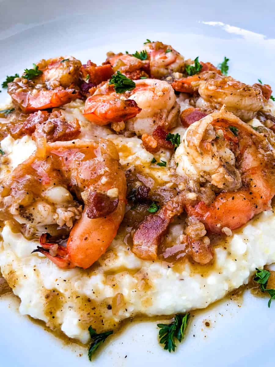 shrimp and grits on a white plate