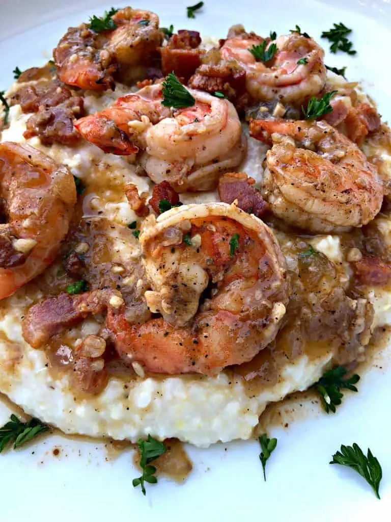 shrimp and grits on a white plate