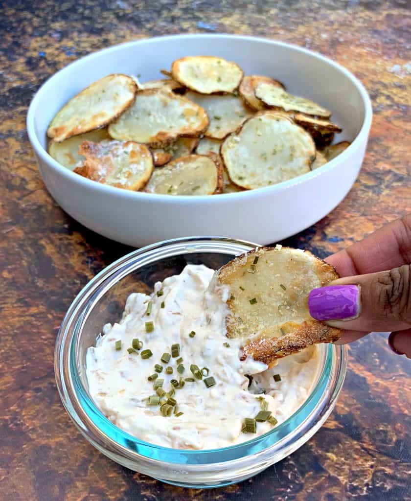 air fryer potato chips in a white bowl with dip