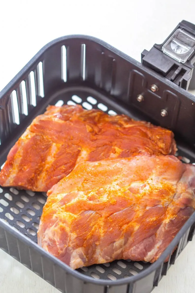 sliced ribs on a cutting board