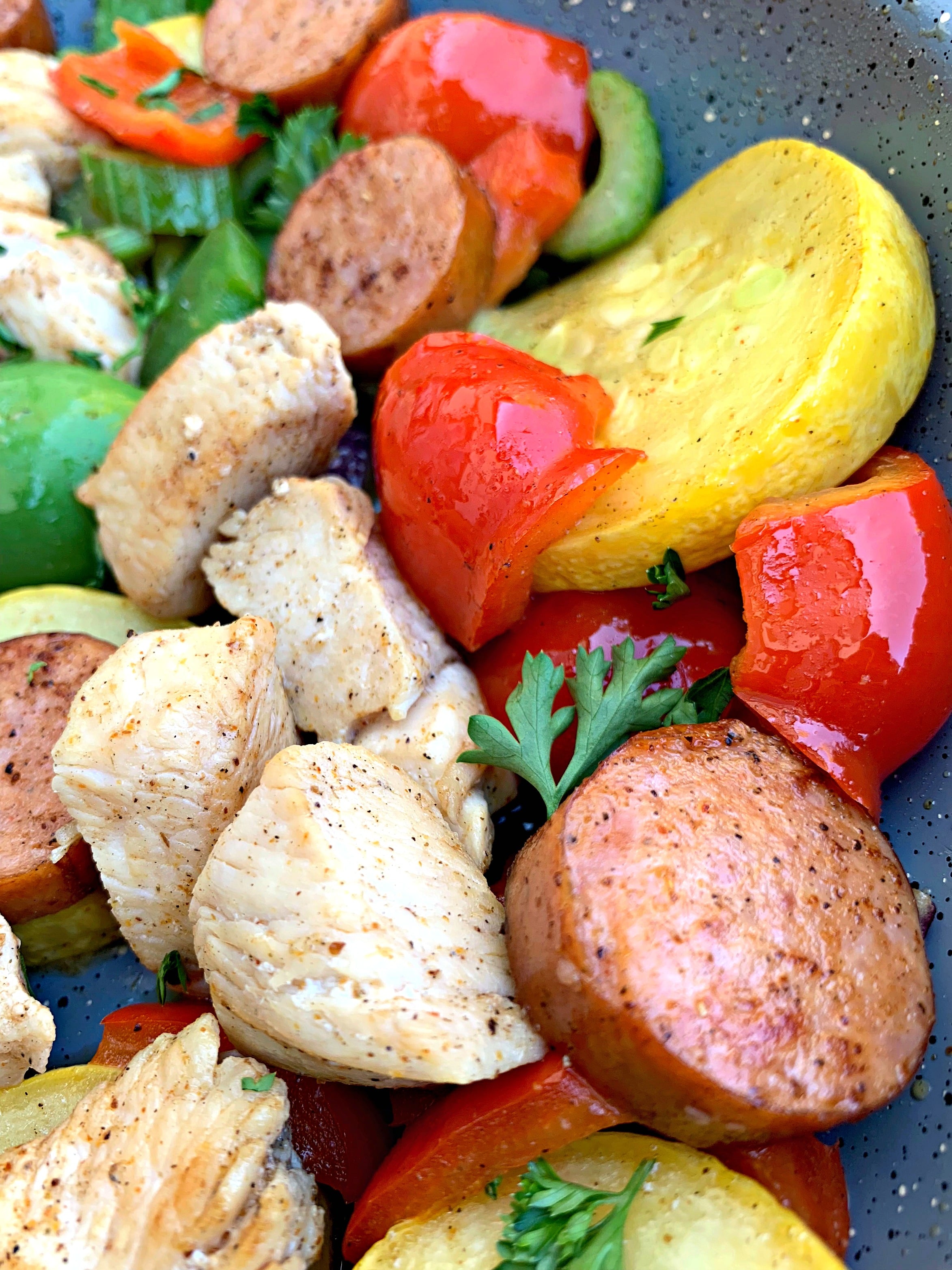 close up photo of cajun chicken sausage skillet 