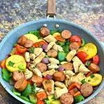 cajun chicken sausage and vegetables in a skillet