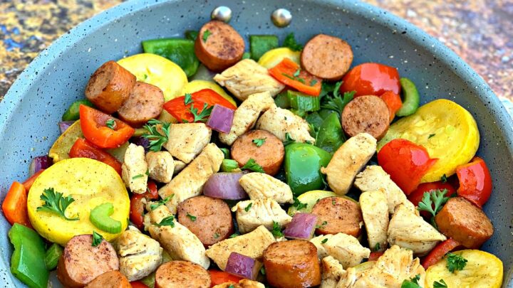 cajun chicken sausage and vegetables in a skillet