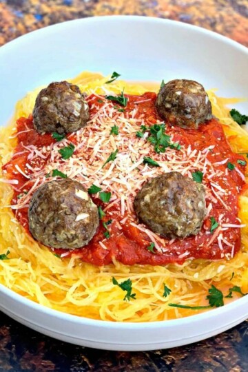 spaghetti squash marinara in a white bowl