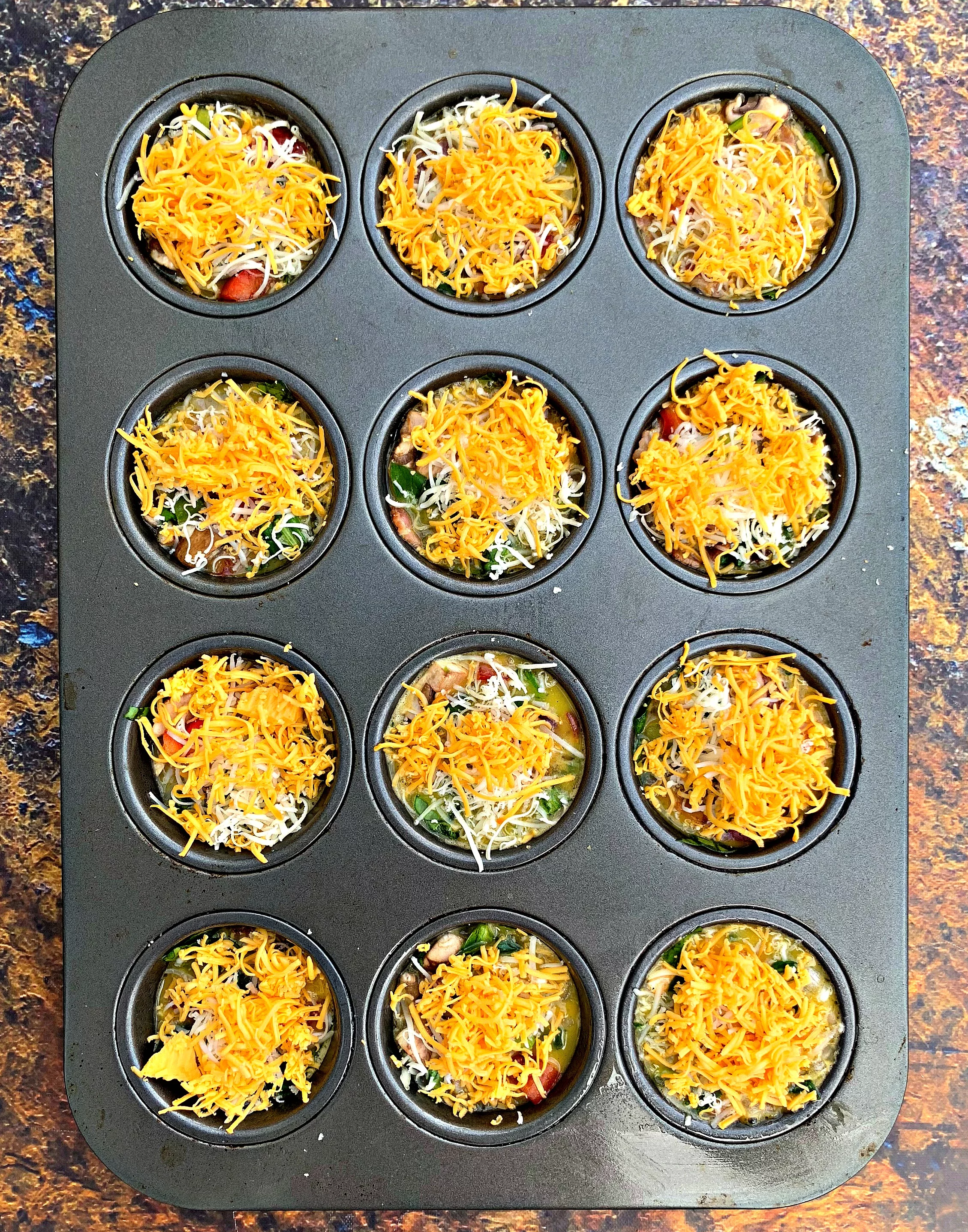 keto bacon egg bites in a muffin tin