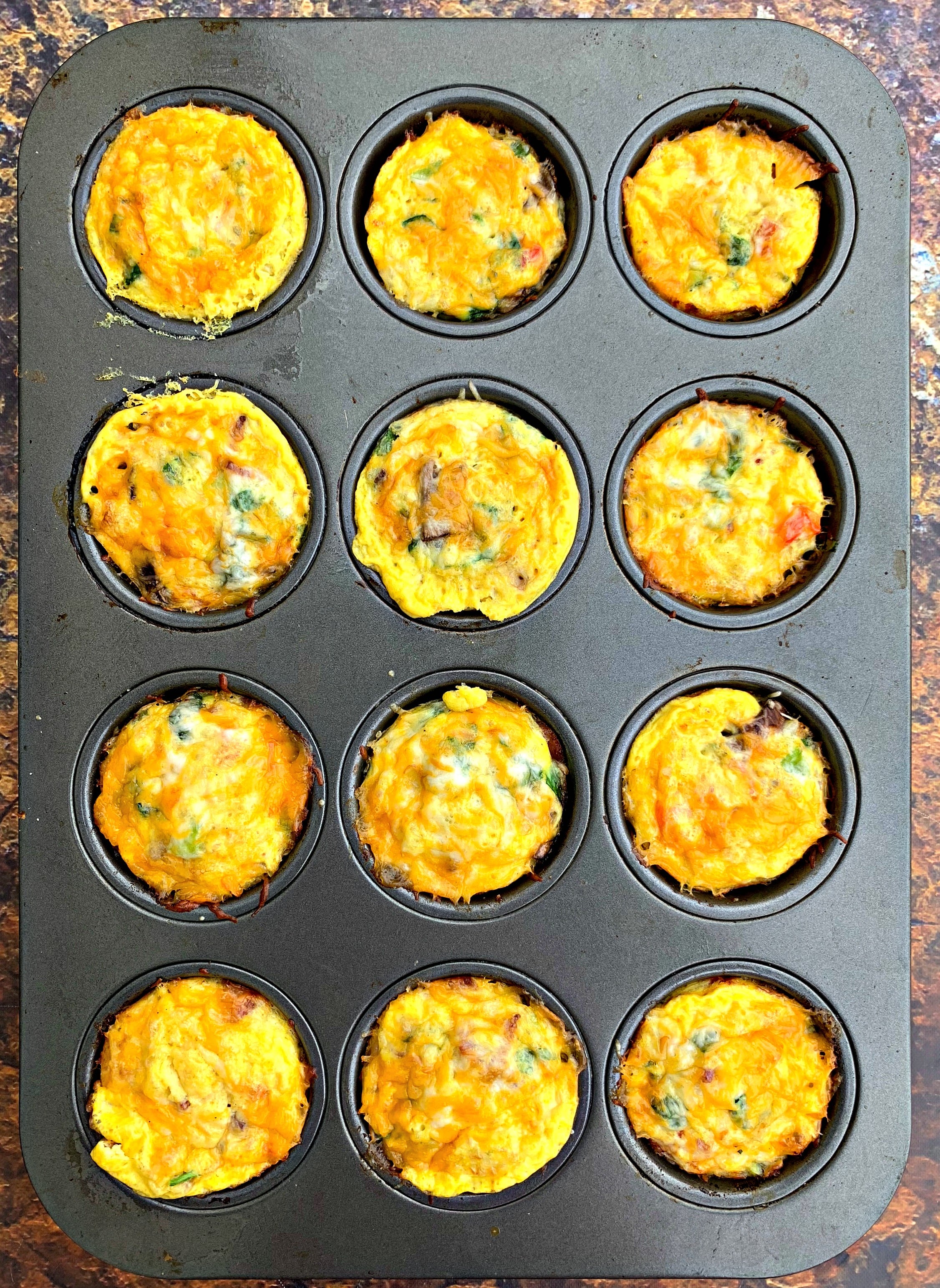 keto bacon egg bites in a muffin tin