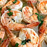 close up of red lobster shrimp scampi in a pan