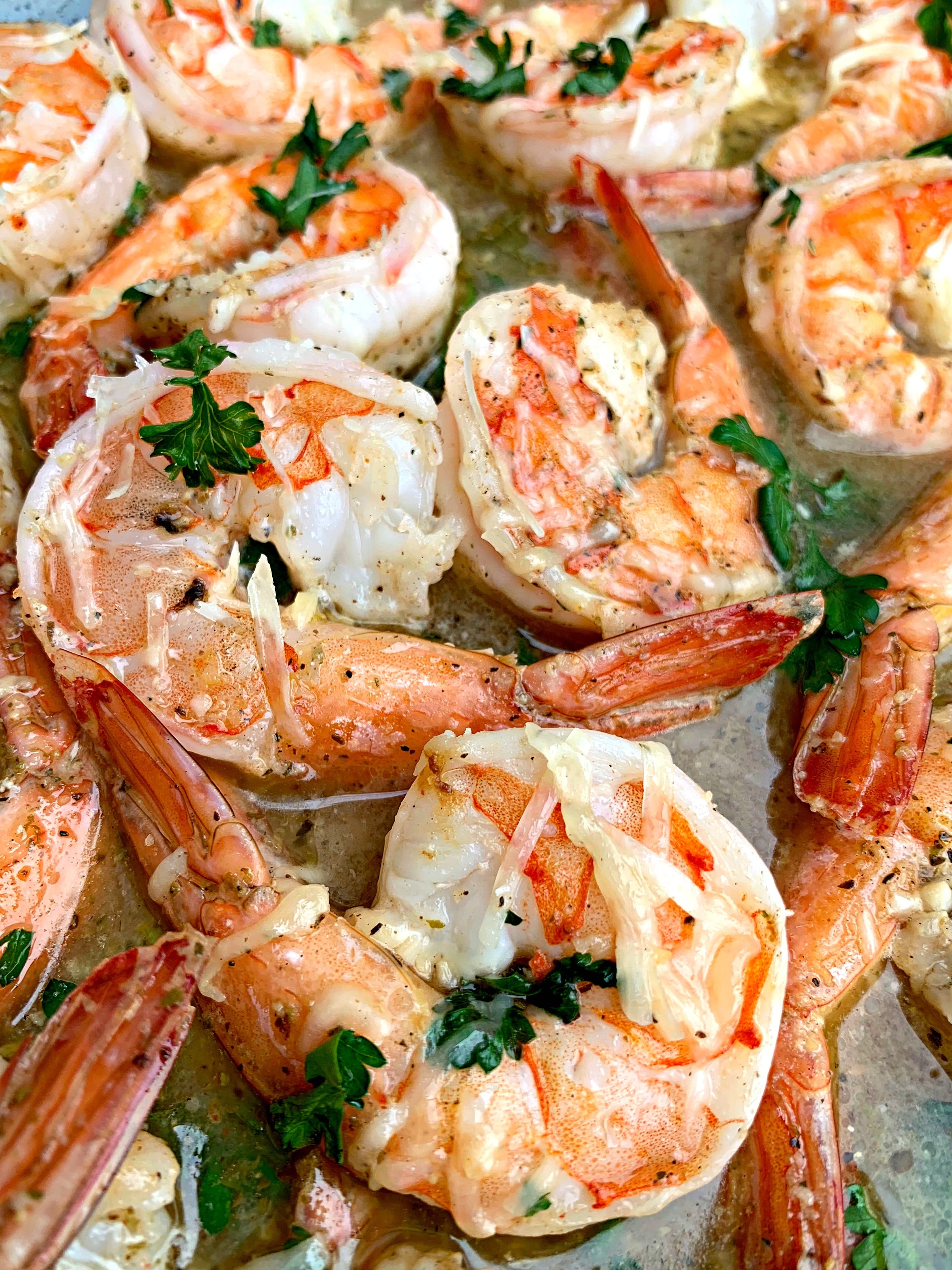 close up of red lobster shrimp scampi in a pan