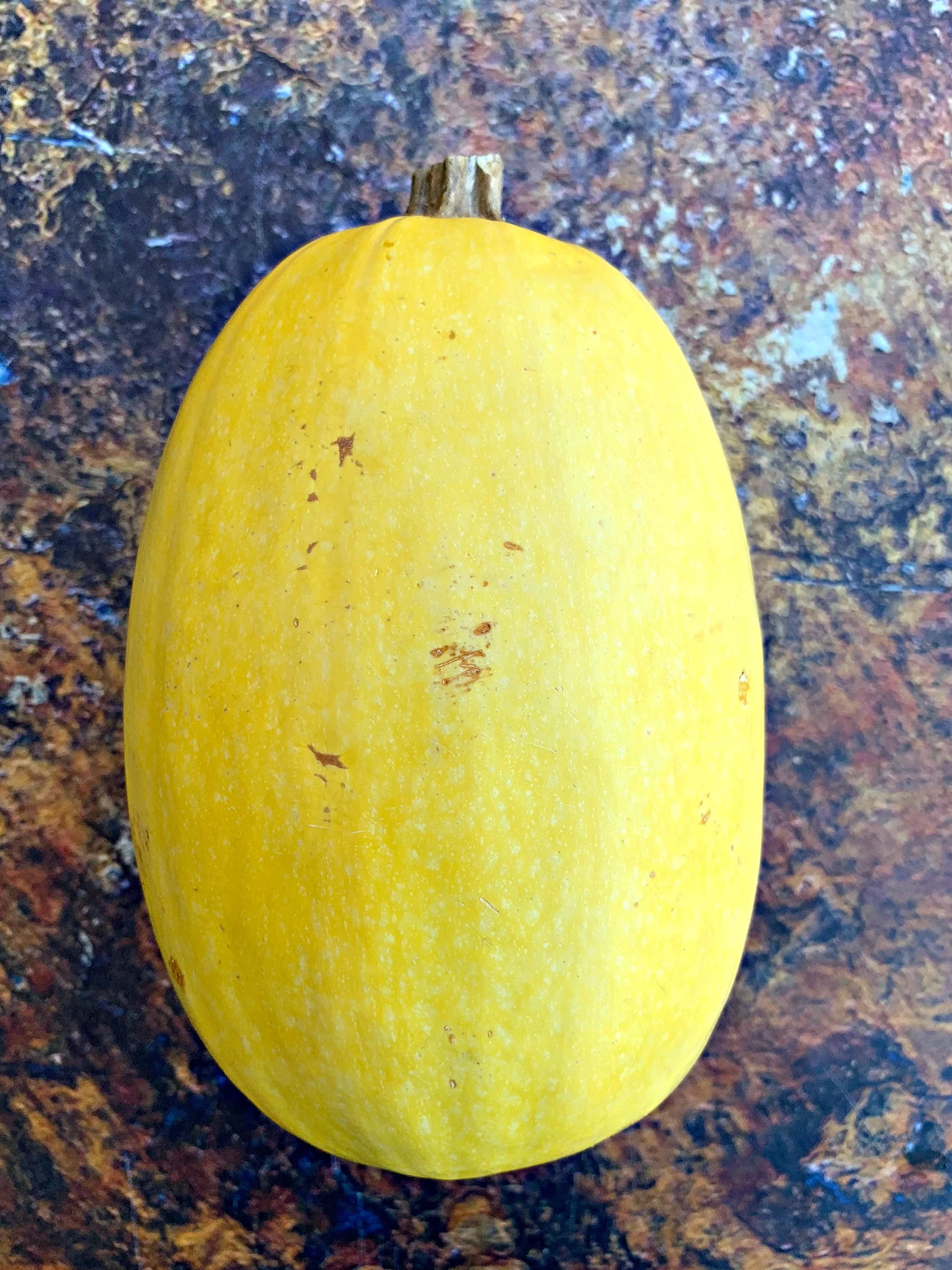 spaghetti squash on a flat surface