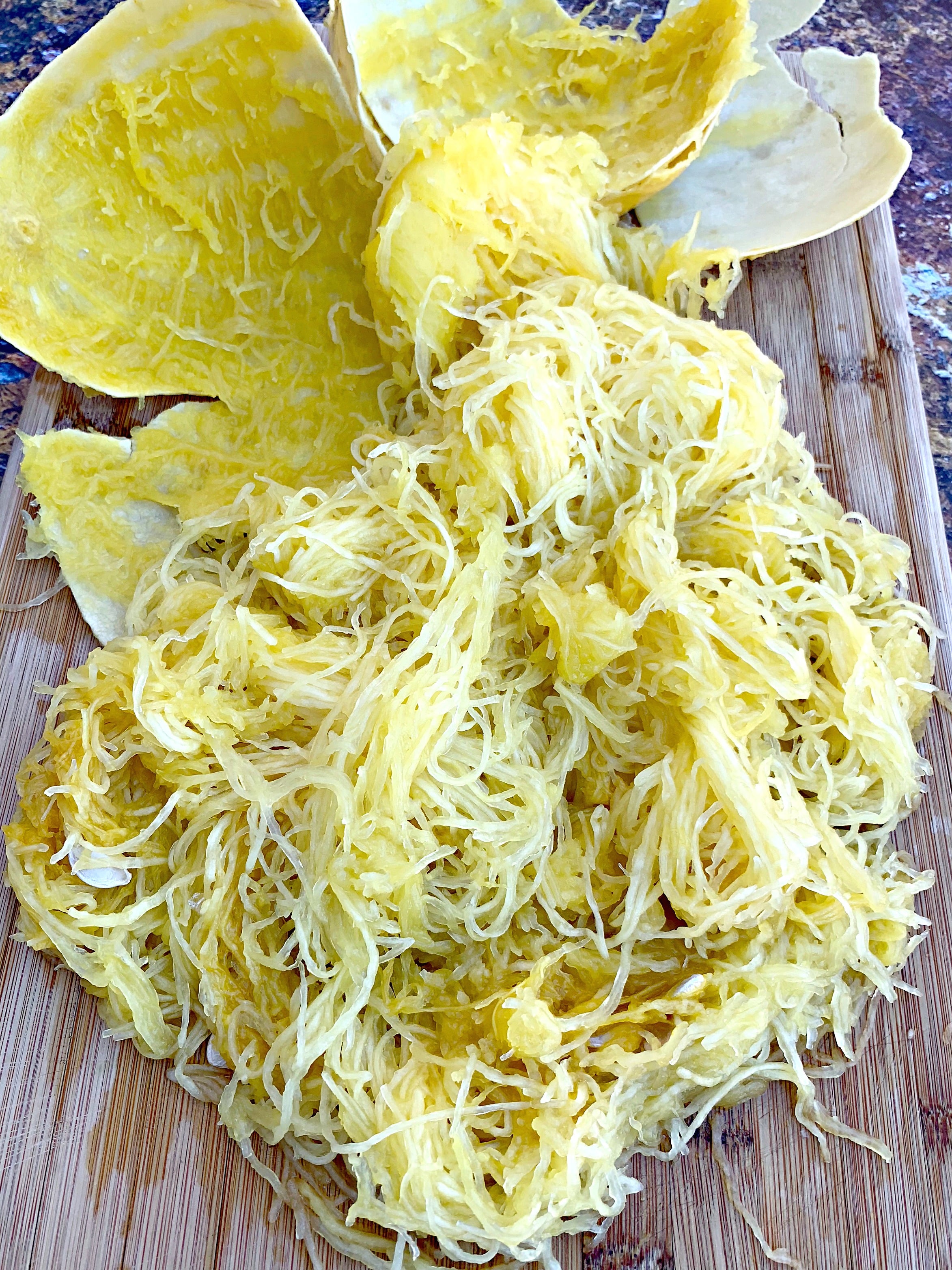 spaghetti squash strands on a cutting board