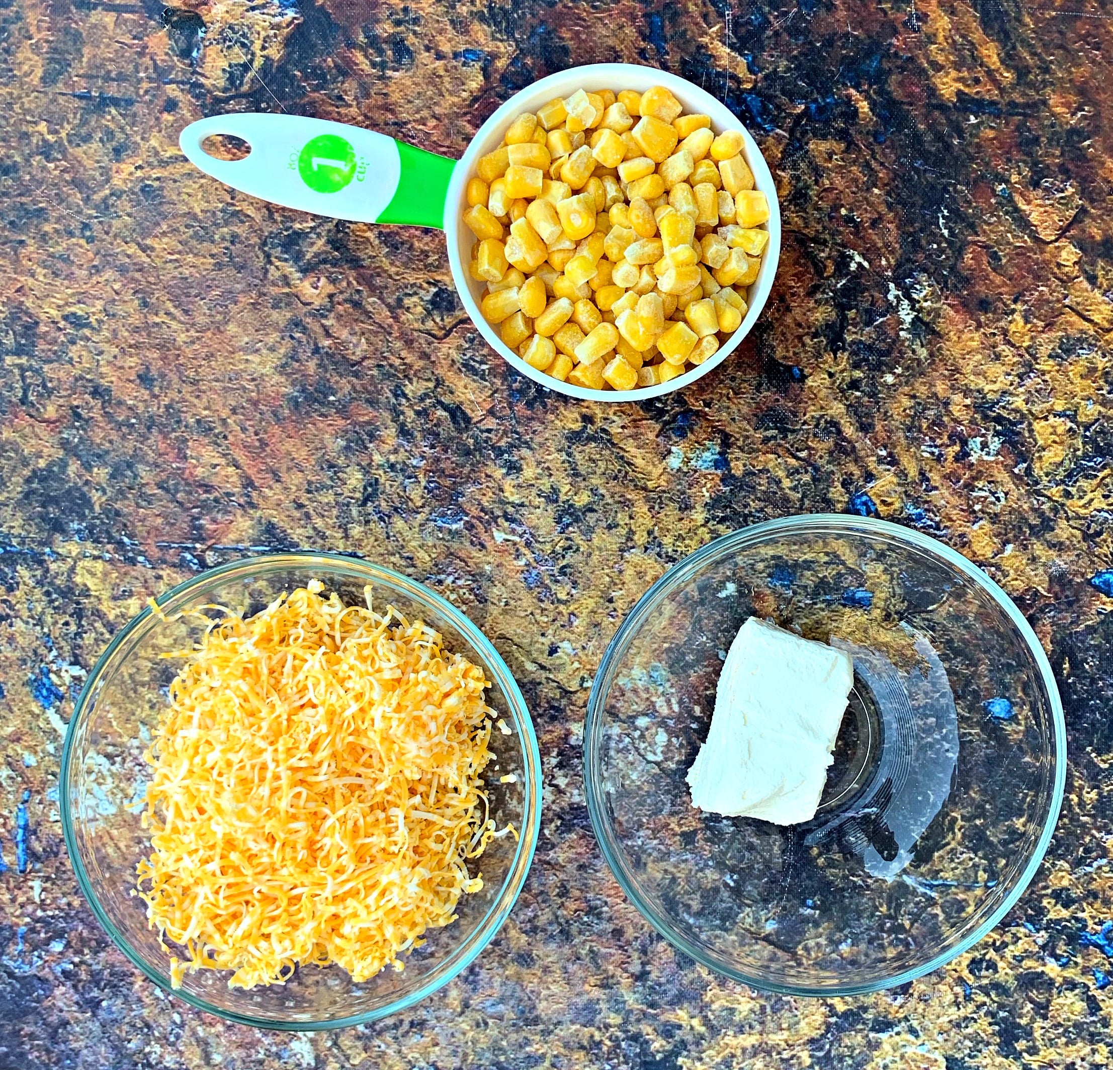 cheese corn and cream cheese in bowls