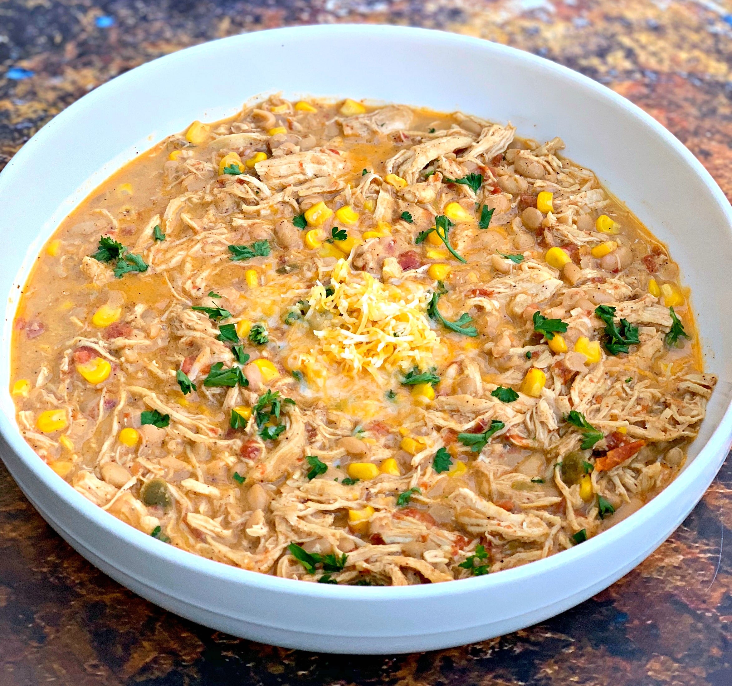 white chicken chili in a white bowl