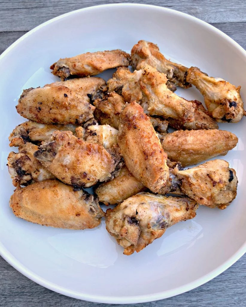 fried air fryer chicken wings in a white bowl