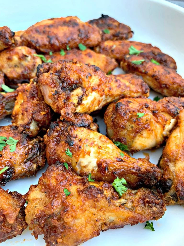 air fryer honey bbq chicken wings in a white bowl