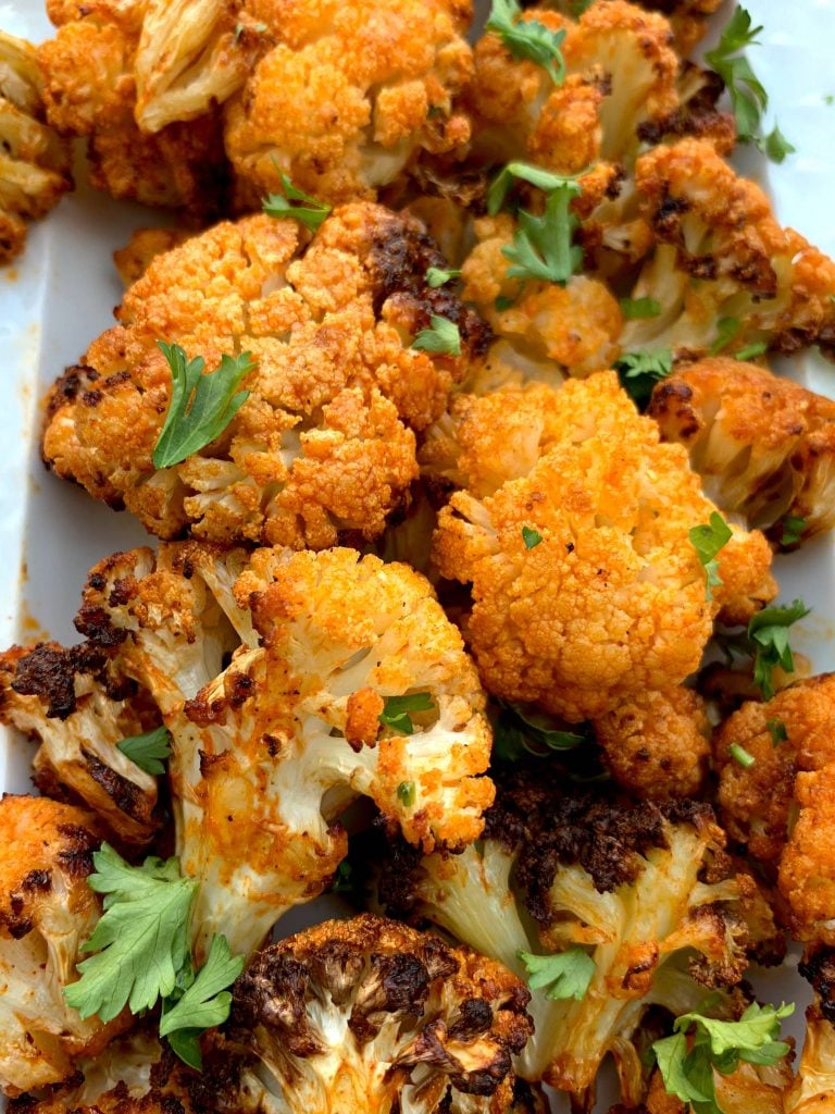 keto buffalo cauliflower wings on a white plate